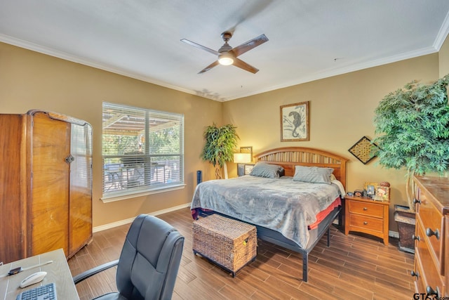 bedroom featuring ceiling fan, crown molding, and hardwood / wood-style floors