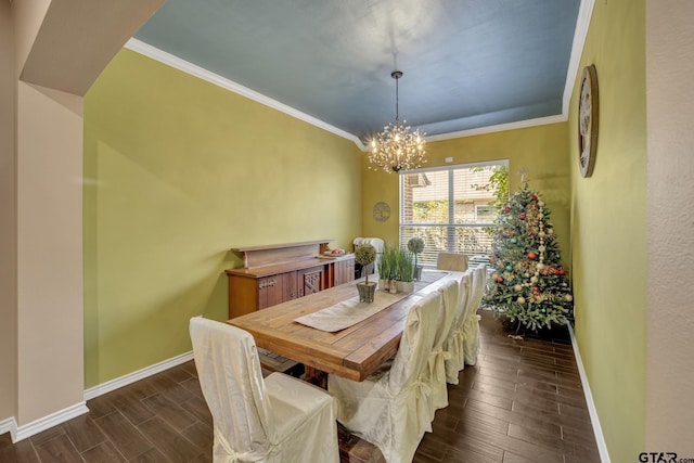 dining room featuring a notable chandelier and crown molding