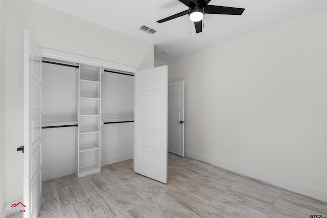 unfurnished bedroom featuring ceiling fan