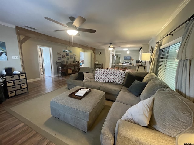 761 S Pacific, Canton, TX 75103 - living area with ceiling fan, wood finished floors, crown molding, and baseboards