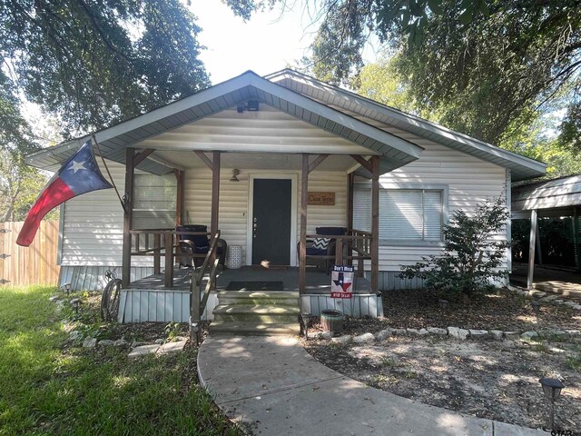 view of front of house with covered porch