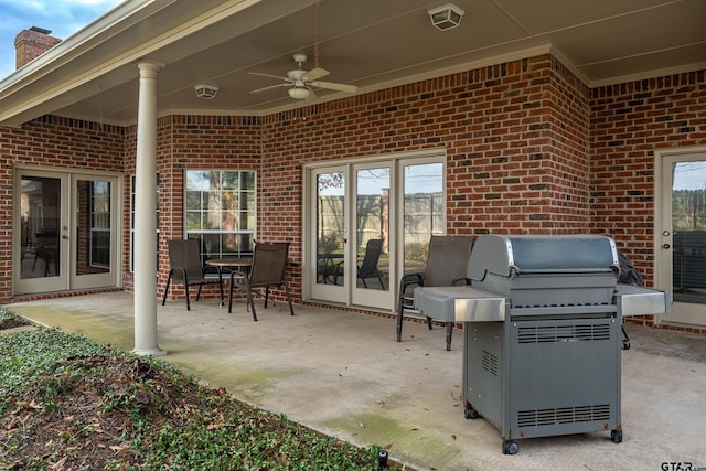 view of patio / terrace with ceiling fan and a grill