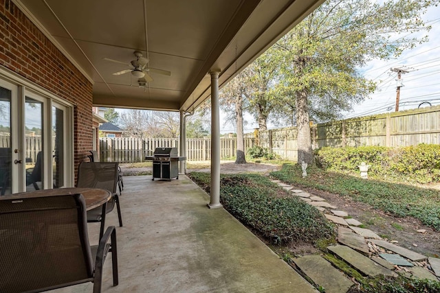 view of patio / terrace with ceiling fan and area for grilling