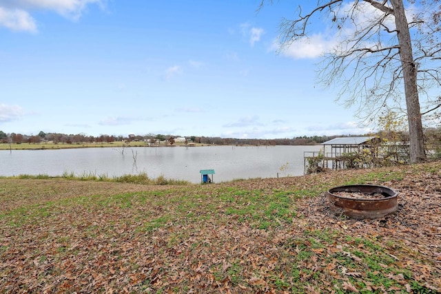 exterior space with a water view