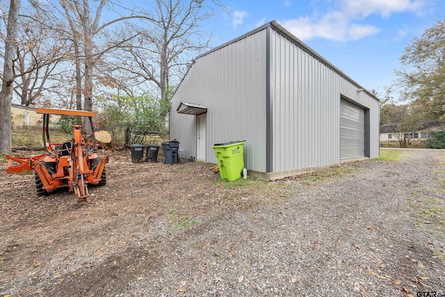 view of outbuilding with a garage