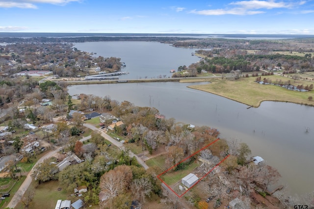 drone / aerial view with a water view