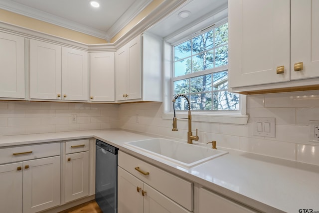 kitchen with decorative backsplash, dishwasher, white cabinets, and sink