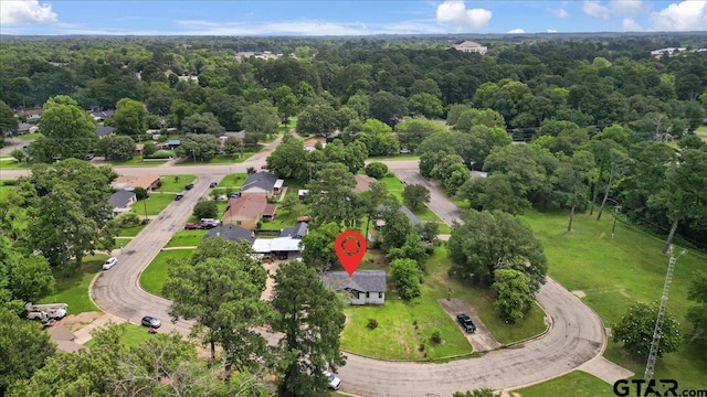 106 Peterson Pl, Longview, TX 75602 - view of property location with a heavily wooded area