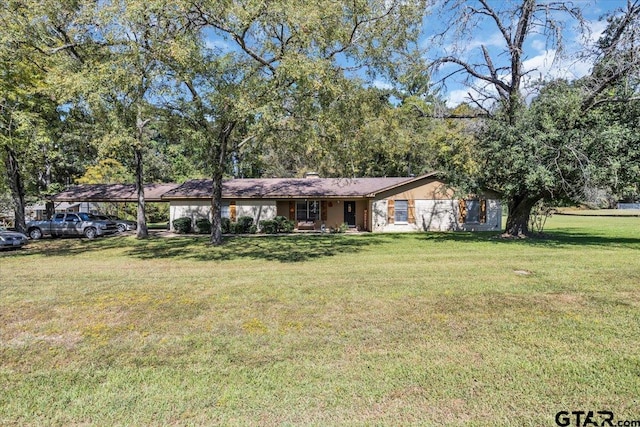 ranch-style house with a front yard