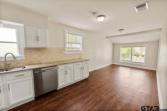 kitchen featuring dishwasher, white cabinetry, and sink