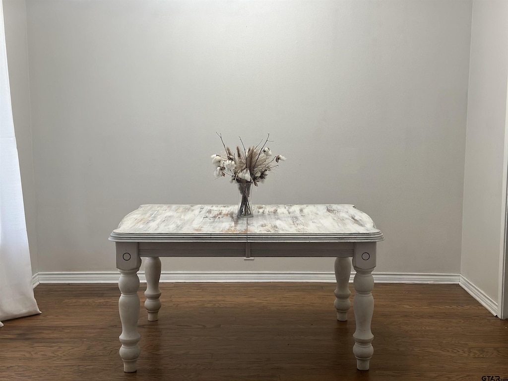 details with wood finished floors and baseboards