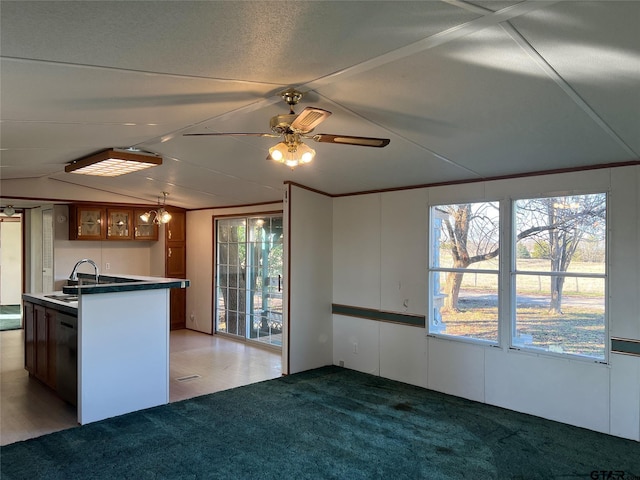 kitchen featuring carpet floors, a wealth of natural light, ceiling fan, and lofted ceiling