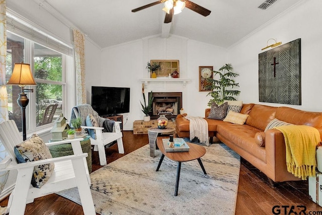 1510 Hideaway Ln W, Hideaway, TX 75771 - living room with hardwood / wood-style floors, a ceiling fan, ornamental molding, lofted ceiling, and a fireplace with raised hearth