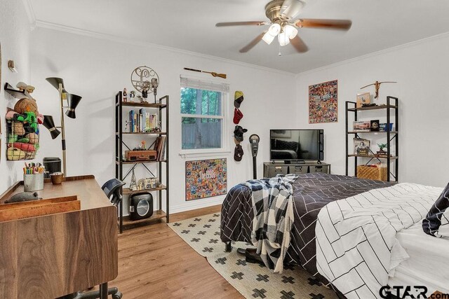 1510 Hideaway Ln W, Hideaway, TX 75771 - bedroom featuring light wood-type flooring, ornamental molding, baseboards, and a ceiling fan