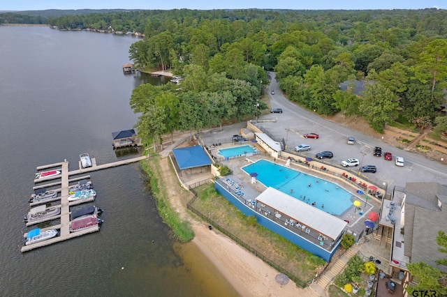 1510 Hideaway Ln W, Hideaway, TX 75771 - aerial view of a forest, a nearby body of water, and a pool