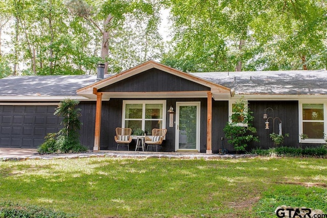 1510 Hideaway Ln W, Hideaway, TX 75771 - single story home with a garage, a front lawn, and covered porch