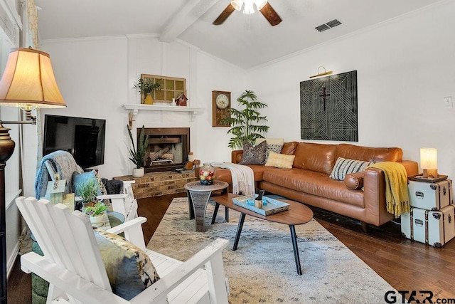 1510 Hideaway Ln W, Hideaway, TX 75771 - living area featuring wood finished floors, a ceiling fan, and a fireplace
