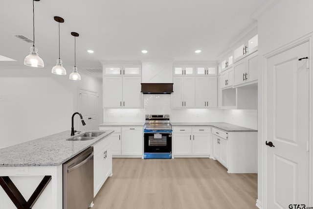 kitchen with white cabinets, sink, and stainless steel appliances