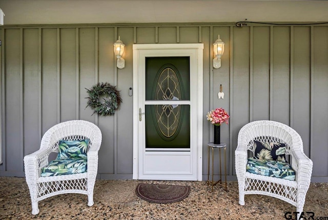 5626 Meadowdale Rd, Flint, TX 75762 - view of exterior entry with board and batten siding and a porch