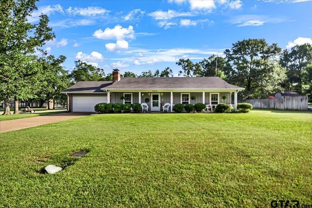 5626 Meadowdale Rd, Flint, TX 75762 - single story home with a porch, a chimney, an attached garage, and concrete driveway