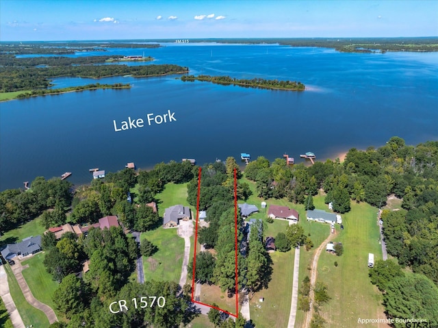 2222 County Road 1570, Alba, TX 75410 - aerial view of property and surrounding area with a nearby body of water and property boundaries highlighted