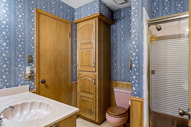 2222 County Road 1570, Alba, TX 75410 - full bathroom featuring wallpapered walls, toilet, tile patterned floors, and vanity