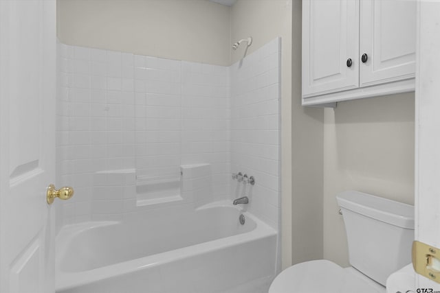 bathroom with shower / bath combination and toilet