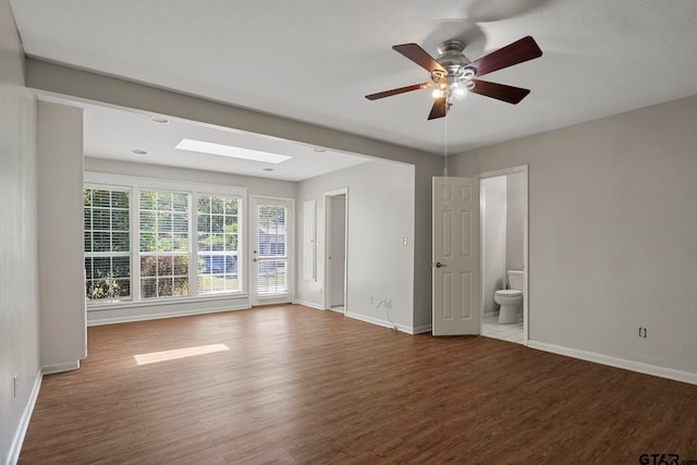 unfurnished room with ceiling fan and light wood-type flooring