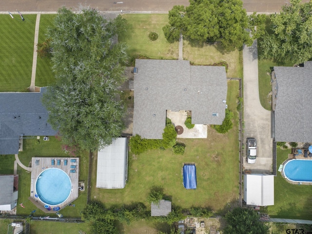 909 Elizabeth St, Gilmer, TX 75644 - aerial overview of property's location featuring a pool area