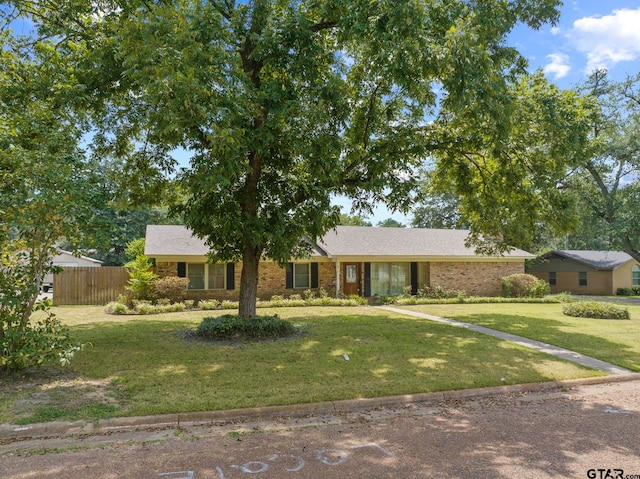 view of front of property with a front lawn