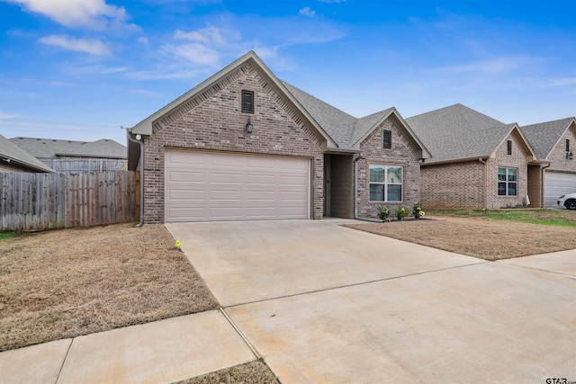 view of front of home with a garage