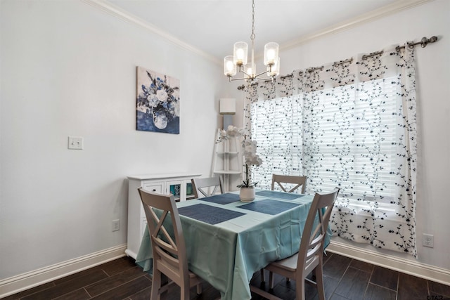 dining room with crown molding and a chandelier