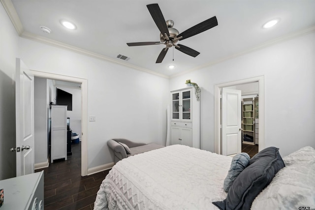 bedroom featuring ornamental molding and ceiling fan