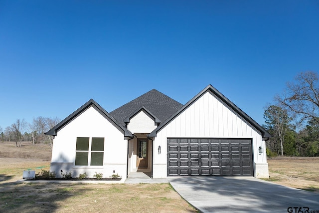 modern farmhouse style home with a garage