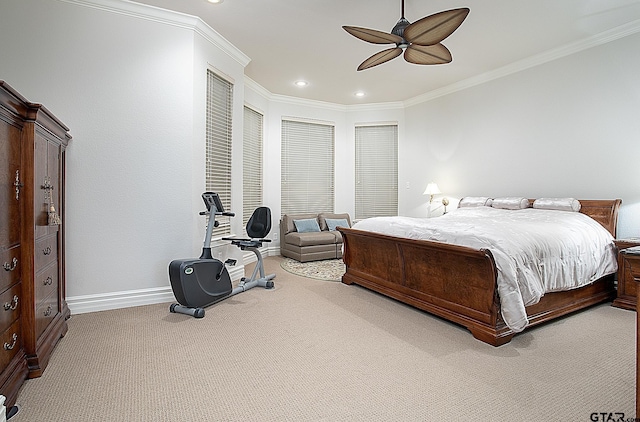 carpeted bedroom featuring ceiling fan, baseboards, crown molding, and recessed lighting