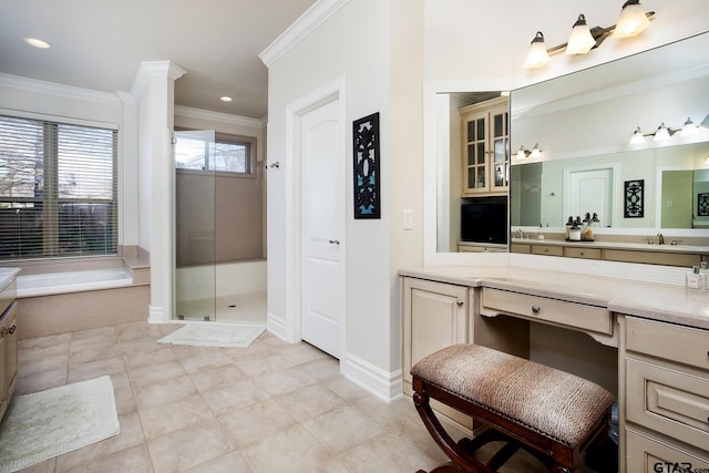 full bath with a stall shower, ornamental molding, tile patterned floors, a garden tub, and vanity