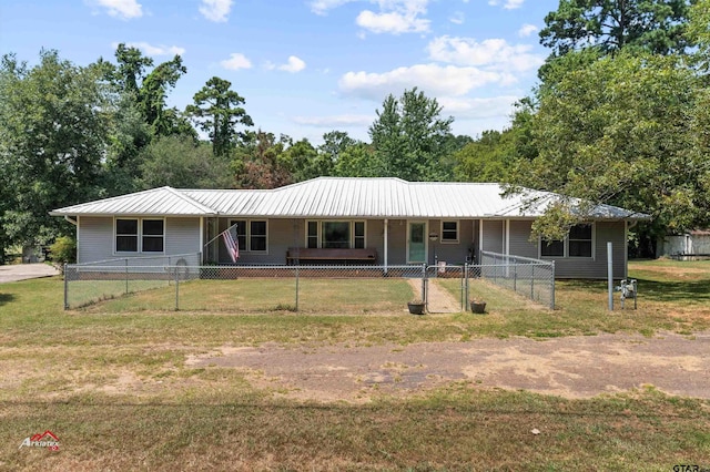 ranch-style house featuring a front lawn