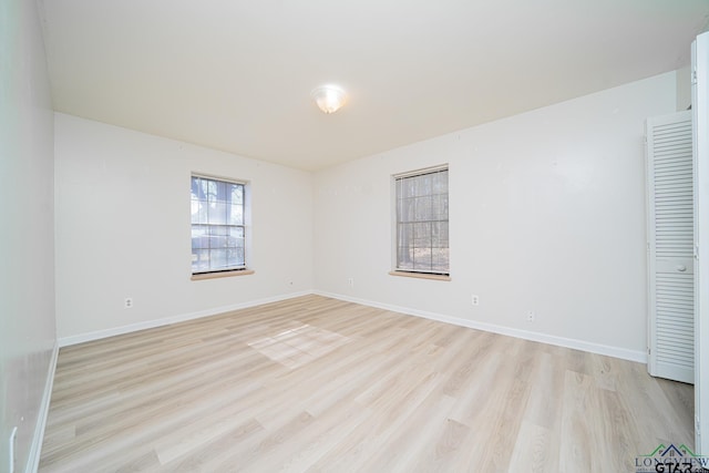 empty room featuring light hardwood / wood-style floors