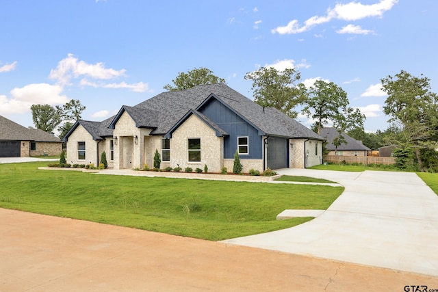 14738 Woodland Creek Dr, Tyler, TX 75706 - view of front of property with brick siding, concrete driveway, an attached garage, a shingled roof, and board and batten siding
