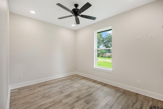 14738 Woodland Creek Dr, Tyler, TX 75706 - empty room featuring light wood-style floors, baseboards, recessed lighting, and a ceiling fan