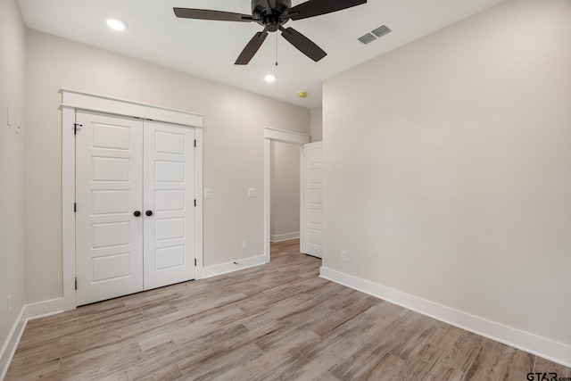 14738 Woodland Creek Dr, Tyler, TX 75706 - unfurnished bedroom with light wood finished floors, baseboards, recessed lighting, a closet, and ceiling fan