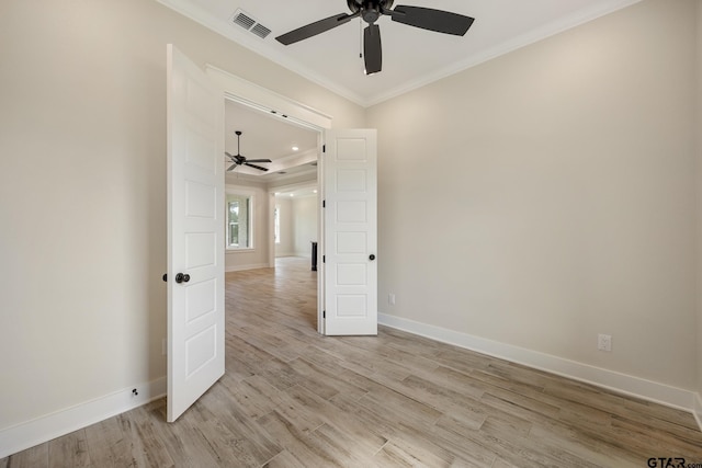 14738 Woodland Creek Dr, Tyler, TX 75706 - empty room featuring a ceiling fan, crown molding, light wood finished floors, and baseboards