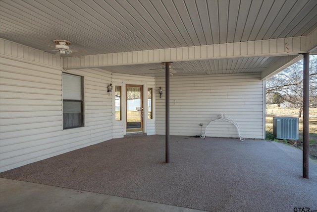 view of patio with central AC unit and ceiling fan