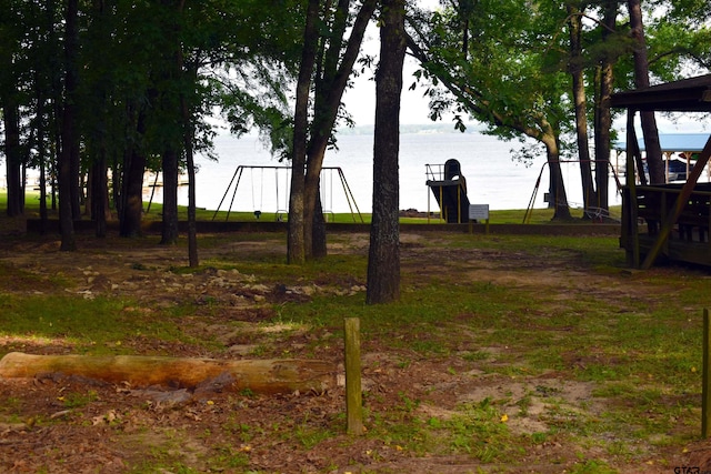 17387 Cherokee Trl, Flint, TX 75762 - view of yard with a water view and a playground
