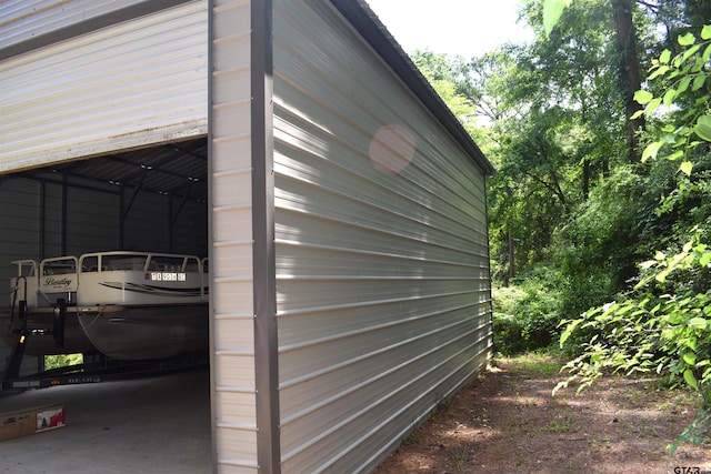 17387 Cherokee Trl, Flint, TX 75762 - view of side of home with a garage