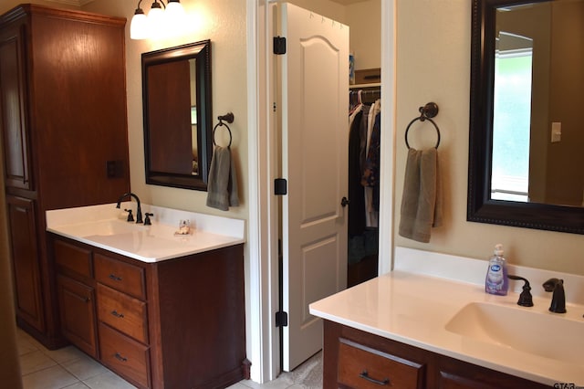 17387 Cherokee Trl, Flint, TX 75762 - full bathroom featuring vanity, a walk in closet, and tile patterned floors
