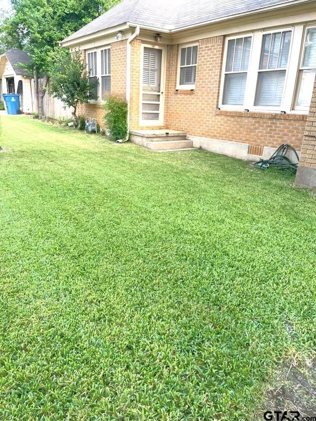 view of front of home with a front yard