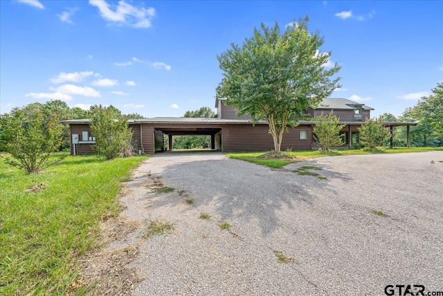 view of front of house featuring a carport