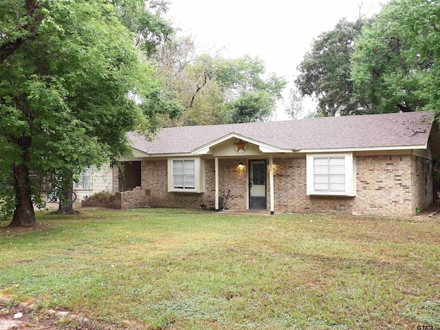 ranch-style house with a front lawn