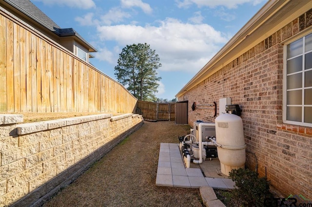 view of yard with a patio area and a fenced backyard